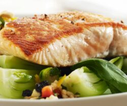 Healthy grilled salmon with brown rice salad